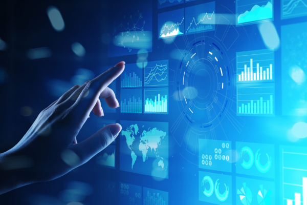 hand pointing to a screen displaying results in different presentation formats.
